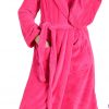 woman wearing pink fluffy fleece dressing gown with hood up