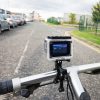 HD Waterproof Action Camera, fixed onto handlebars on a bike